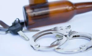 Marion, IN Bail Bond Information Lookup 12 The handcuff, car key and bottle on the table in Marion, IN.