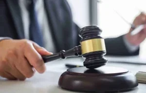 Marion, IN Bail Bond Information Lookup 10 The judge is taking gavel in his hand in Marion, IN.