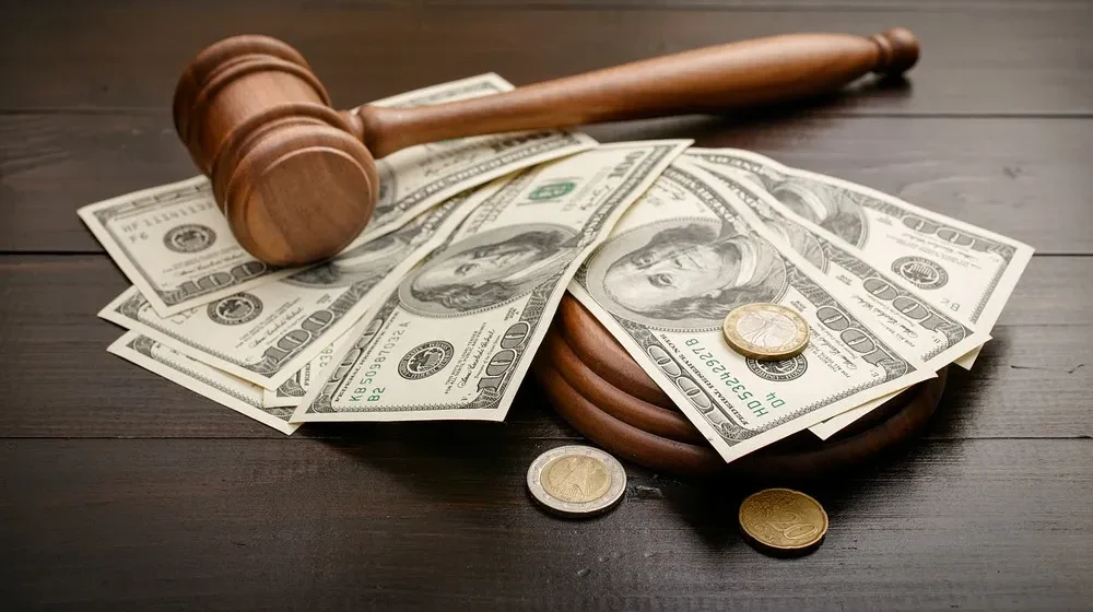Kokomo, IN Arrest Information Lookup 8 Judge's gavel placed on a wooden table with cash in Kokomo, IN.